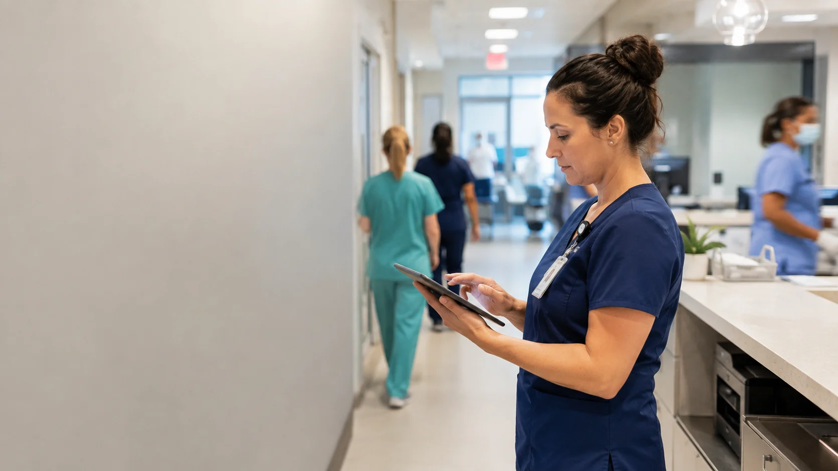 Healthcare manager coordinating clinical staff and workforce schedules in an outpatient facility.