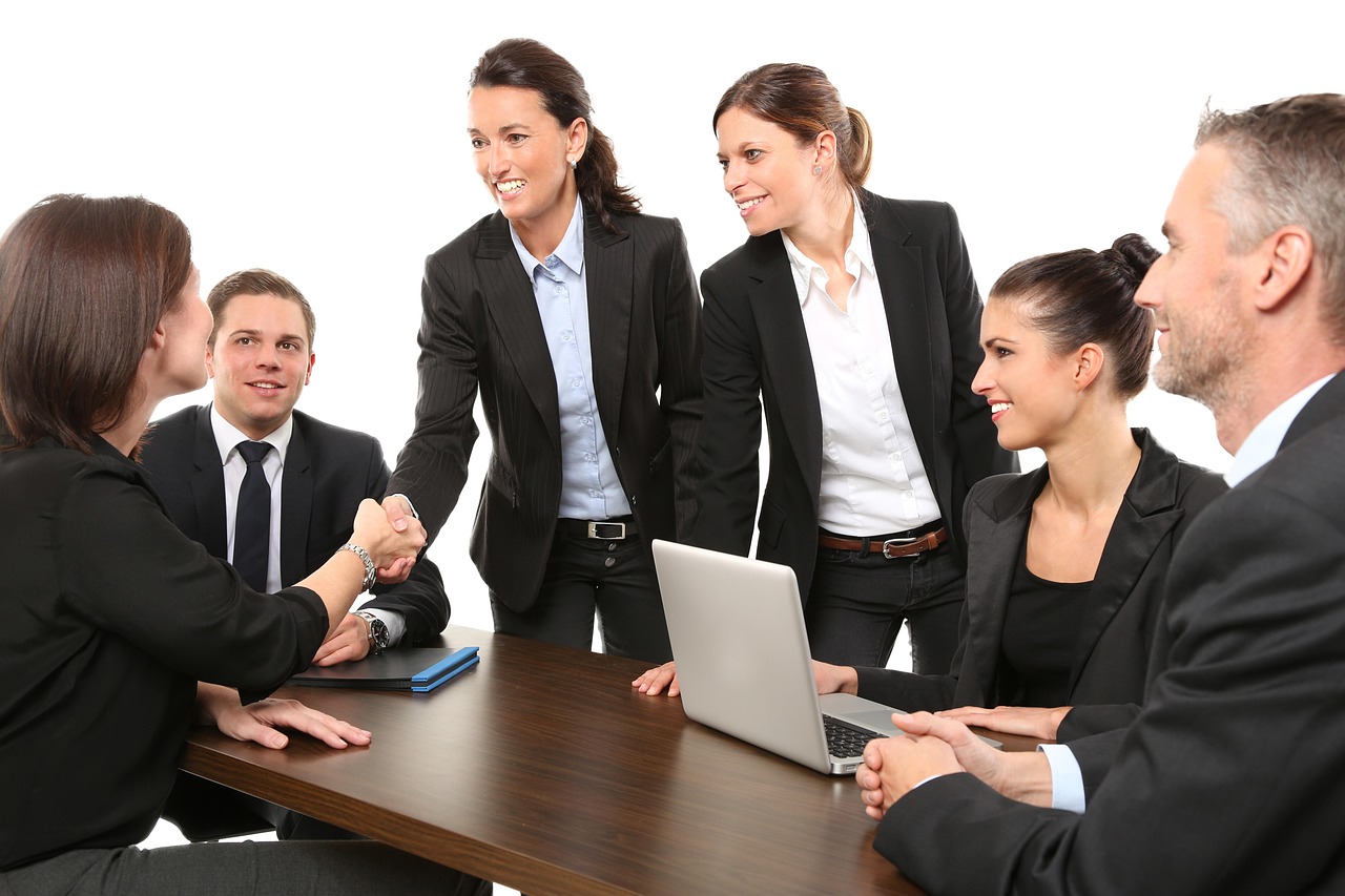 HR team analyzing cost comparison charts