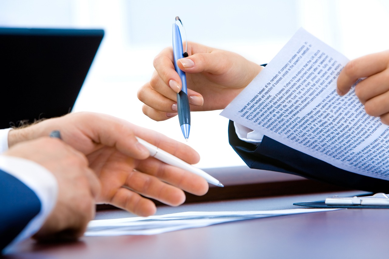 Business professional calmly reviewing ERC documents — taking a measured approach before jumping to conclusions