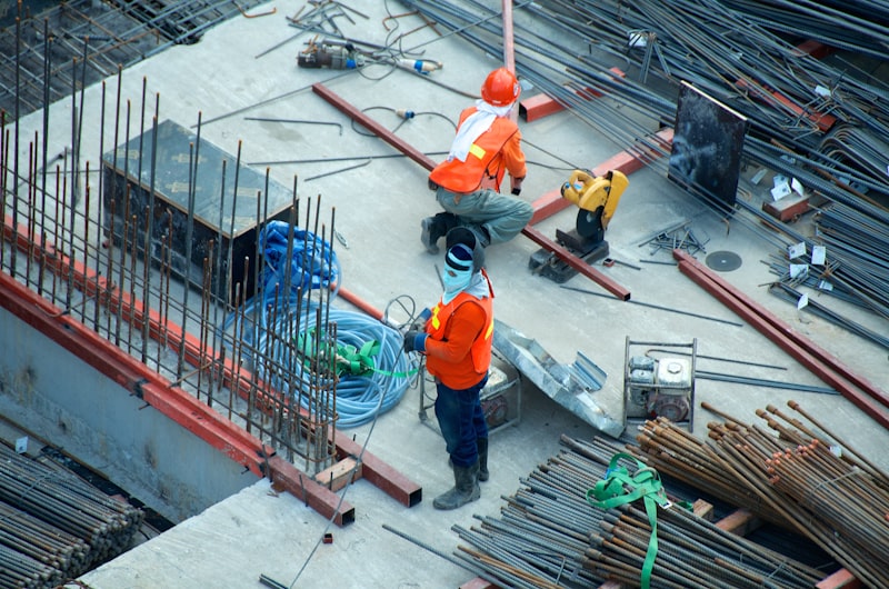 Blue collar workers in manufacturing and construction covered by PEO workers compensation insurance and safety programs