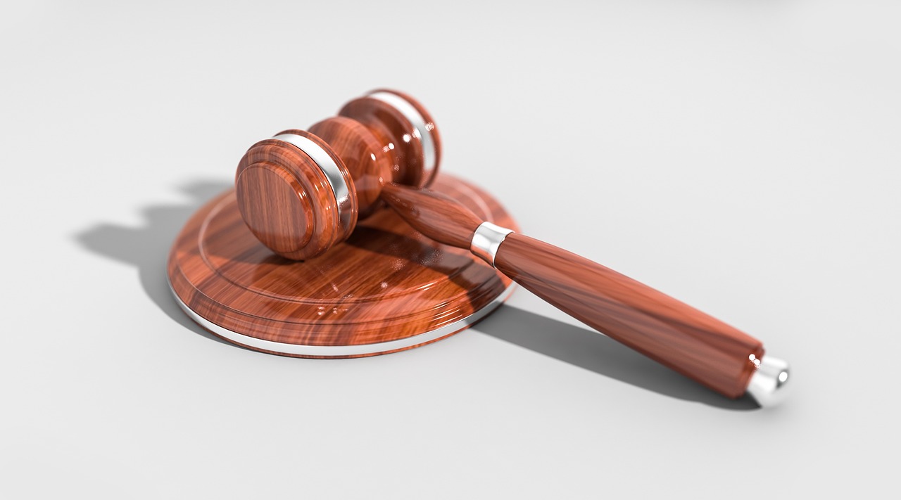 Employment law risk assessment with legal documents and business litigation prevention materials