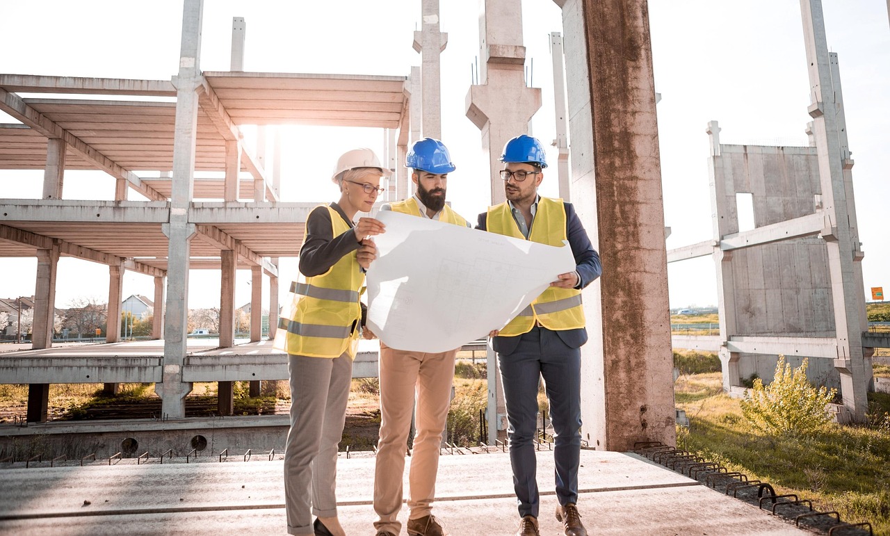 OSHA workplace safety inspection with compliance officer reviewing hard hats and safety equipment